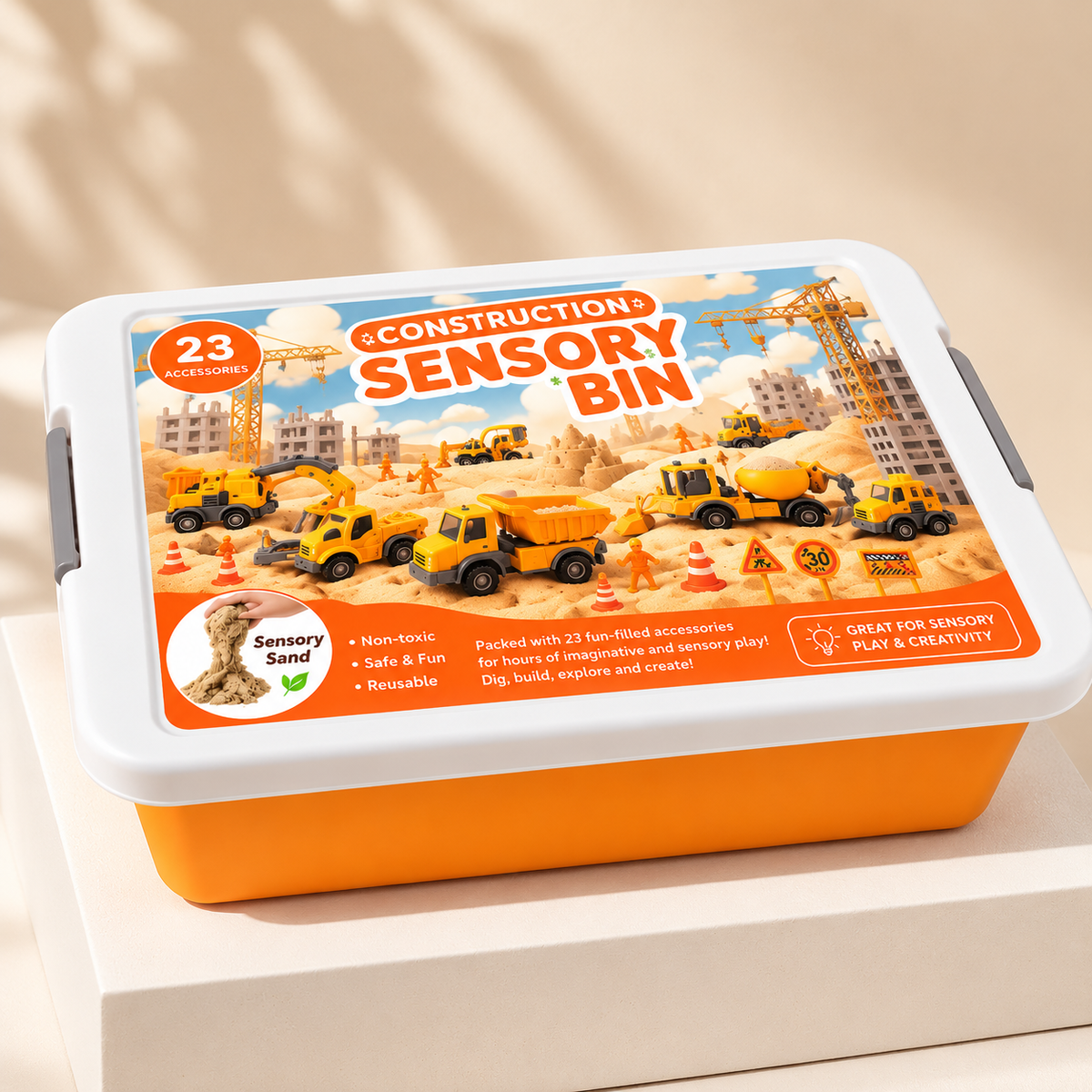 Sensorisk leklåda med byggfordon och sand